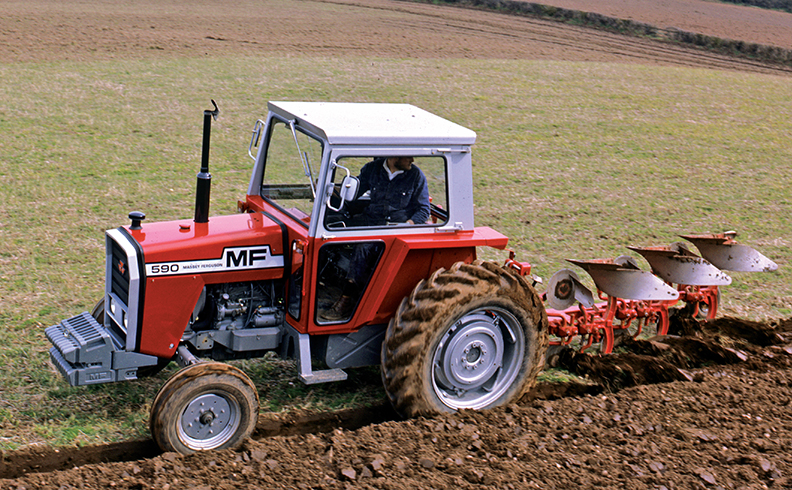 Massey Ferguson 590 ploughing a field